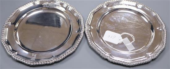 A pair of early Victorian silver plates, with gadrooned border and engraved armorial, by Mortimer & Hunt, London, 1839, 35 oz.